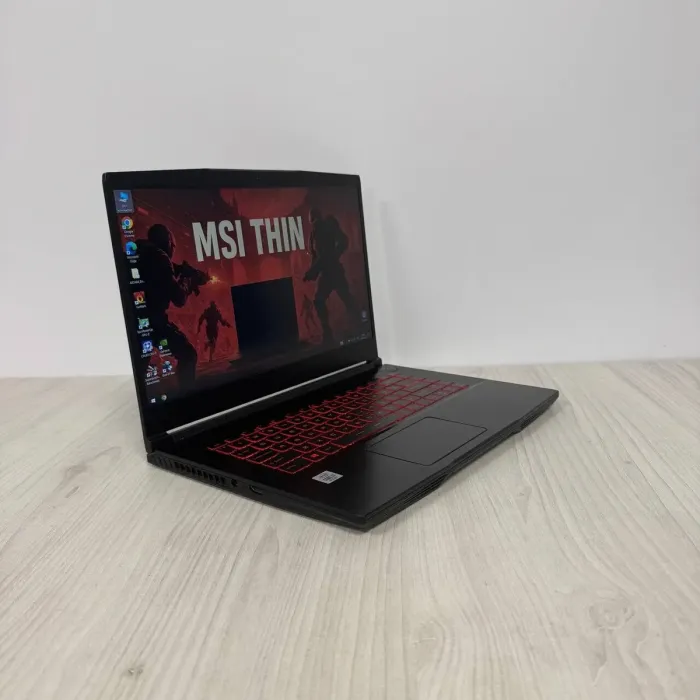 Ігровий ноутбук Б-клас MSI GF65 Thin 10SER / 15.6" (1920x1080) IPS / Intel Core i7-10750H (6 (12) ядер по 2.6 - 5.0 GHz) / 16 GB DDR4 / 512 GB SSD NVMe / nVidia GeForce RTX 2060, 6 GB GDDR6, 192-bit / WebCam б/в - зображення 4