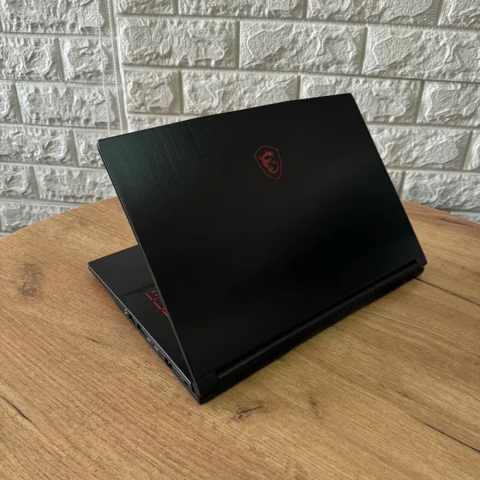 Ігровий ноутбук Б-клас MSI GF65 Thin 10SDR / 15.6" (1920x1080) IPS / Intel Core i7-10750H (6 (12) ядер по 2.6 - 5.0 GHz) / 8 GB DDR4 / 512 GB SSD / nVidia GeForce GTX 1660 Ti, 6 GB GDDR6, 192-bit / WebCam б/в - зображення 6
