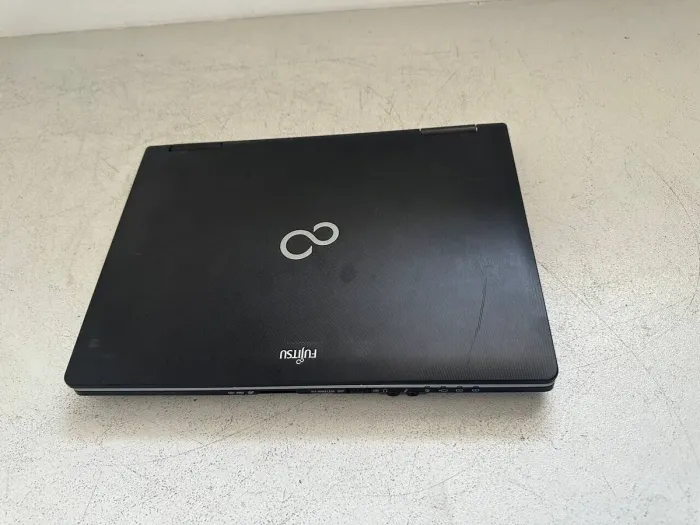 Ноутбук Б-клас Fujitsu LifeBook S752 / 14" (1366x768) TN / Intel Core i5-3340M (2 (4) ядра по 2.7 - 3.4 GHz) / 8 GB DDR3 / 120 GB SSD / Intel HD Graphics 4000 / WebCam / VGA б/в - зображення 7