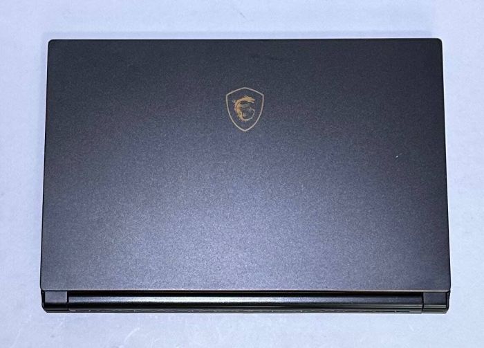 Ігровий ноутбук Б-клас MSI GS65 Stealth Thin 8RF / 15.6" (1920x1080) IPS / Intel Core i7-8750H (6 (12) ядер по 2.2 - 4.1 GHz) / 32 GB DDR4 / 512 GB SSD / nVidia GeForce GTX 1070 Max-Q, 8 GB GDDR5, 256-bit / WebCam / Win 11 Pro б/в - зображення 6