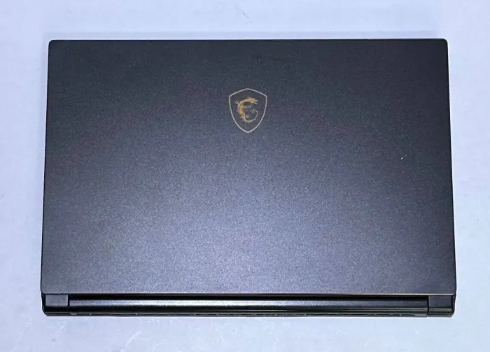 Ігровий ноутбук Б-клас MSI GS65 Stealth Thin 8RF / 15.6" (1920x1080) IPS / Intel Core i7-8750H (6 (12) ядер по 2.2 - 4.1 GHz) / 32 GB DDR4 / 512 GB SSD / nVidia GeForce GTX 1070 Max-Q, 8 GB GDDR5, 256-bit / WebCam / Win 11 Pro б/в - зображення 6