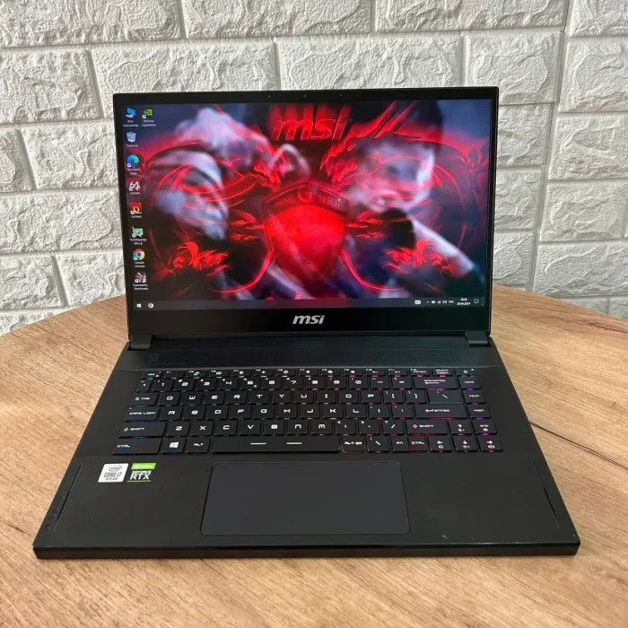 Ігровий ноутбук MSI GS66 Stealth 10SE / 15.6" (1920x1080) IPS / Intel Core i7-10750H (6 (12) ядер по 2.6 - 5.0 GHz) / 16 GB DDR4 / 512 GB SSD / nVidia GeForce RTX 2060, 6 GB GDDR6, 192-bit / WebCam б/в - зображення 2
