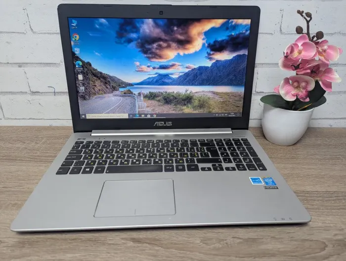 Ноутбук Asus K551L / 15.6" (1366x768) TN / Intel Core i3-4030U (2 (4) ядра по 1.9 GHz) / 8 GB DDR3 / 128 GB SSD / Intel HD Graphics 4400 / WebCam б/в - зображення 2