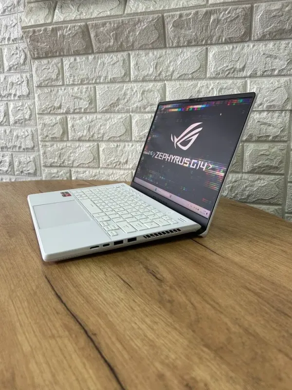 Ігровий ноутбук Asus ROG Zephyrus G14 GA402RJ / 14" (2560x1600) IPS / AMD Ryzen 9 6900HS (8 (16) ядер по 3.3 - 4.9 GHz) / 16 GB DDR4 / 1000 GB SSD / AMD Radeon RX 6700S, 8 GB GDDR6, 128-bit / WebCam б/в - зображення 5