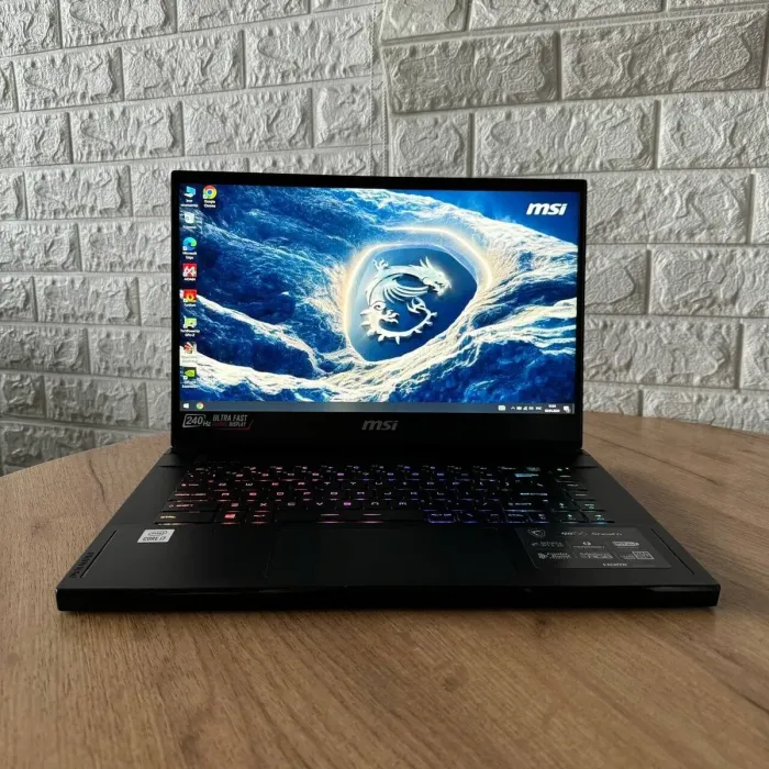Ігровий ноутбук Б-клас MSI GS66 Stealth 10UE / 15.6" (1920x1080) IPS / Intel Core i7-10750H (6 (12) ядер по 2.6 - 5.0 GHz) / 16 GB DDR4 / 1000 GB SSD / nVidia GeForce RTX 3060, 6 GB GDDR6, 192-bit / WebCam б/в - зображення 2