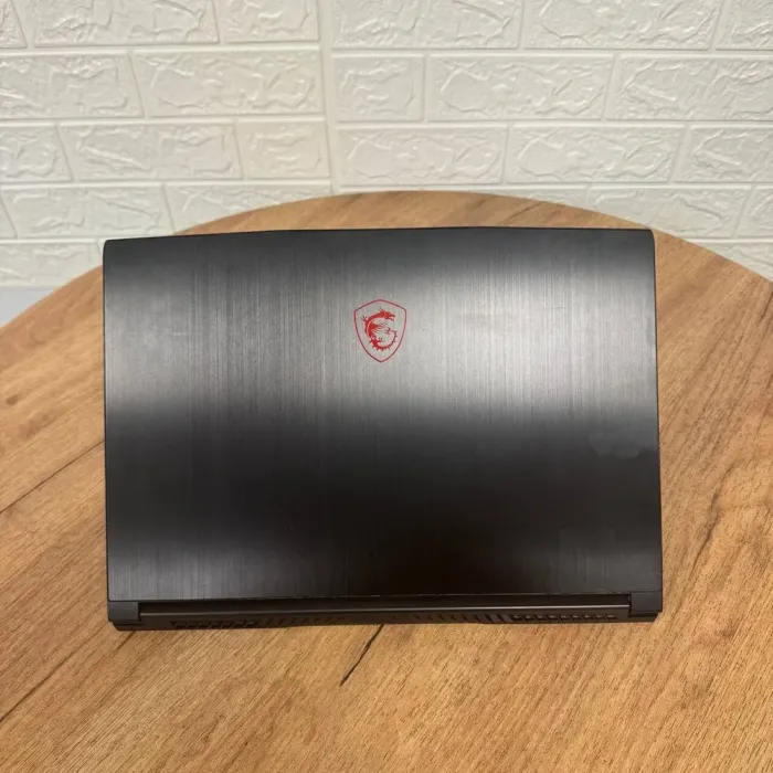 Ігровий ноутбук Б-клас MSI GF65 Thin 9SEXR / 15.6" (1920x1080) IPS / Intel Core i7-9750H (6 (12) ядра по 2.6 - 4.5 GHz) / 16 GB DDR4 / 512 GB SSD NVMe / nVidia GeForce RTX 2060, 6 GB GDDR6, 192-bit / WebCam б/в - зображення 3