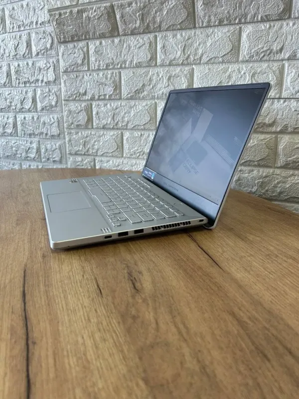 Ігровий ноутбук Asus ROG Zephyrus G14 GA401QM / 14" (1920x1080) IPS / AMD Ryzen 9 5900HS (8 (16) ядер по 3.0 - 4.6 GHz) / 16 GB DDR4 / 512 GB SSD / nVidia GeForce RTX 3060, 6 GB GDDR6, 192-bit б/в - зображення 5