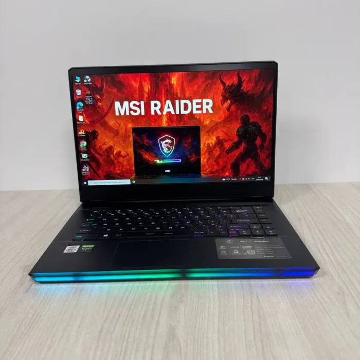 Ігровий ноутбук MSI GE66 Raider 10SFS / 15.6" (1920x1080) IPS / Intel Core i7-10750H (6 (12) ядер по 2,6 - 5,0 ГГц) / 32 ГБ DDR4 / 1000 ГБ SSD NVMe / nVidia GeForce RTX 2070 Super, 8 ГБ GDDR6, 256-bit / WebCam б/в - зображення 2