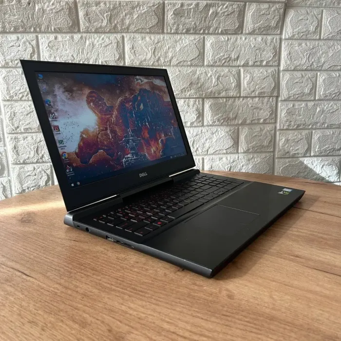 Ігровий ноутбук Б-клас Dell Inspiron 15 Gaming 7567 / 15.6" (1920x1080) TN / Intel Core i5-7300HQ (4 ядра по 2.5 - 3.5 GHz) / 16 GB DDR4 / 256 GB SSD / nVidia GeForce GTX 1050 Ti, 4 GB GDDR5, 128-bit б/в - зображення 4
