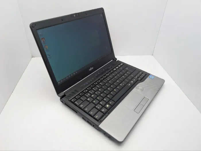 Ноутбук Fujitsu LifeBook S792 / 13.3" (1366x786) TN / Intel Core i7-3612QM (4 (8) ядра по 2.1 - 3.1 GHz) / 8 GB DDR3 / 640 GB HDD / Intel HD Graphics 4000 / WebCam б/в - зображення 5