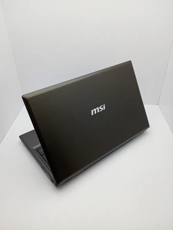 Ноутбук MSI CX61 / 15.6" (1366x768) TN / Intel Core i3-4000M (2 (4) ядра по 2.4 GHz) / 6 GB DDR3 / 500 GB HDD / Intel HD Graphic 4600 / WebCam б/в - зображення 5