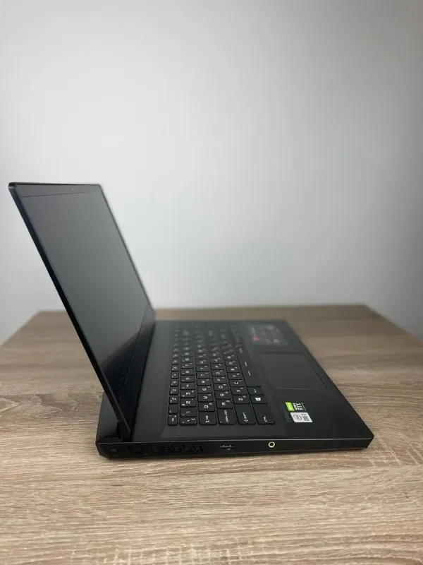 Ігровий ноутбук MSI GP66 Leopard / 15.6" (1920x1080) TN / Intel Core i7-10750H (6 (12) ядер по 2.6 - 5.0 GHz) / 16 GB DDR4 / 500 GB SSD / nVidia GeForce RTX 3070, 8 GB GDDR6, 256-bit / WebCam / Win 10 б/в - зображення 4