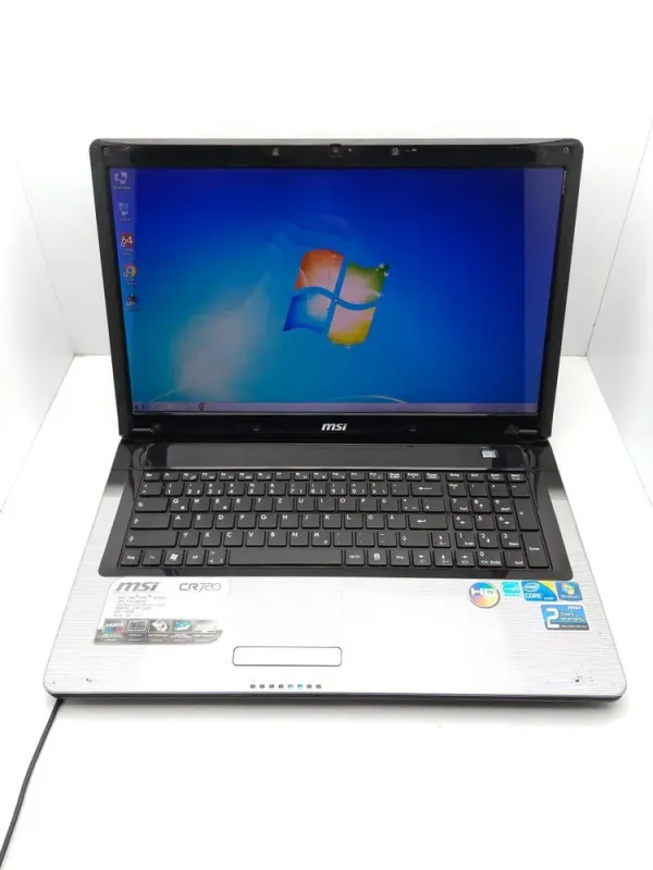 Ноутбук MSI CR720 / 17.3" (1600x900) TN / Intel Core i3-330M (2 (4) ядра по 2.1 - 2.5 GHz) / 6 GB DDR3 / 250 GB HDD / Intel HD Graphics 2000 / WebCam / АКБ не тримає б/в - зображення 2