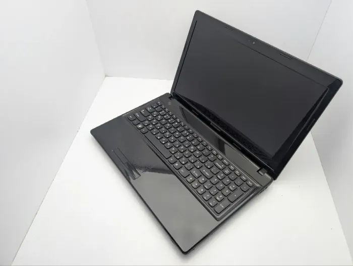 Ноутбук Lenovo IdeaPad G585 / 15.6" (1366x768) TN / AMD E1-1200 (2 ядра по 1.4 GHz) / 6 GB DDR3 / 500 GB HDD / AMD Radeon HD 7310 Graphics / WebCam / DVD-ROM б/в - зображення 7