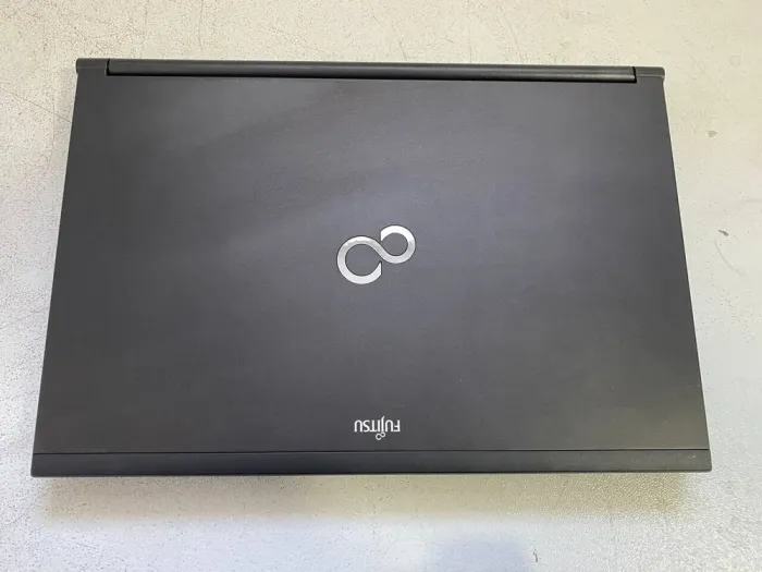 Мобільна робоча станція Fujitsu Celsius H720 / 15.6" (1920x1080) TN / Intel Core i7-3720QM (4 (8) ядра по 2.6 - 3.6 GHz) / 16 GB DDR3 / 256 GB SSD / nVidia Quadro K1000M, 2 GB GDDR3, 128-bit / WebCam б/в - зображення 7