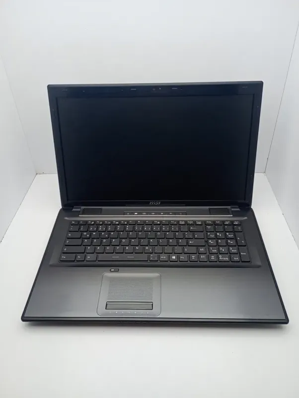 Ноутбук MSI CR70 / 17.3" (1600x900) TN / Intel Core i5-4310M (2 (4) ядра по 2.7 - 3.4 GHz) / 8 GB DDR3 / 1000 GB HDD / Intel HD Graphics 4600 / WebCam б/в - зображення 7