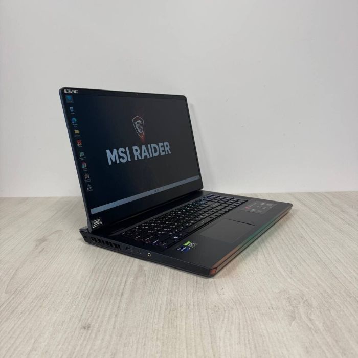Ігровий ноутбук Б-класу MSI GE76 Raider 11UH / 17,3" (1920x1080) IPS / Intel Core i9-11980HK (8 (16 ядер по 3,3 - 5,0 ГГц) / 32 ГБ DDR4 / 512 ГБ SSD / nVidia GeForce RTX 3080, 16 ГБ GDDR6, 256-біт / WebCam б/в - зображення 7