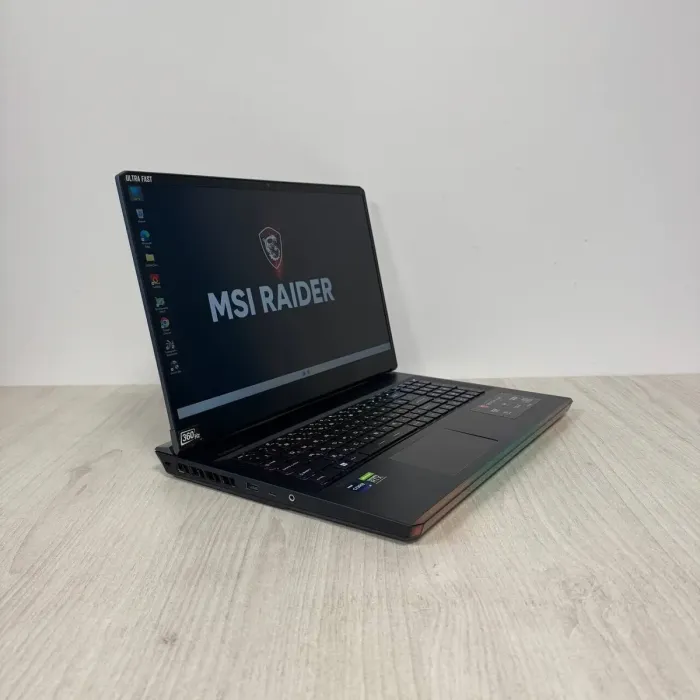 Ігровий ноутбук Б-класу MSI GE76 Raider 11UH / 17,3" (1920x1080) IPS / Intel Core i9-11980HK (8 (16 ядер по 3,3 - 5,0 ГГц) / 32 ГБ DDR4 / 512 ГБ SSD / nVidia GeForce RTX 3080, 16 ГБ GDDR6, 256-біт / WebCam б/в - зображення 7