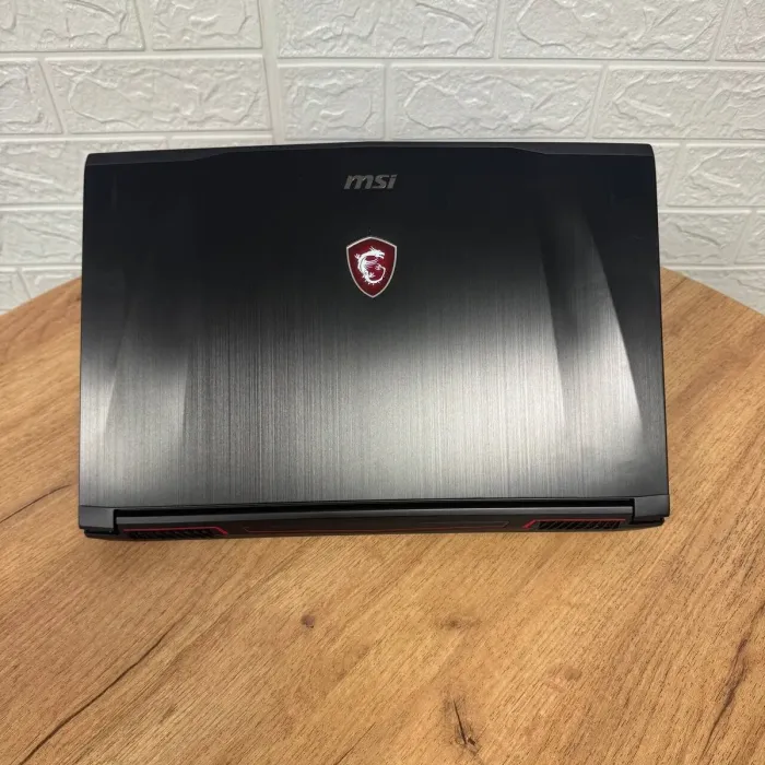 Ігровий ноутбук Б-клас MSI GF62VR 7RF Apache Pro / 15.6" (3840x2160) IPS / Intel Core i7-7700HQ (4 (8) ядра по 2.8 - 3.8 GHz) / 16 GB DDR4 / 128 GB SSD + 1000 GB HDD / nVidia GeForce GTX 1060, 6 GB GDDR5, 192-bit / WebCam б/в - зображення 3