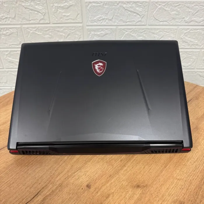 Ігровий ноутбук Б-клас MSI GL63 8RC / 15.6" (1920x1080) IPS / Intel Core i5-8300H (4 (8) ядра по 2.3 - 4.0 GHz) / 8 GB DDR4 / 128 GB SSD M.2 + 1000 GB HDD / nVidia GeForce GTX 1050, 2 GB GDDR5, 128-bit / WebCam б/в - зображення 3
