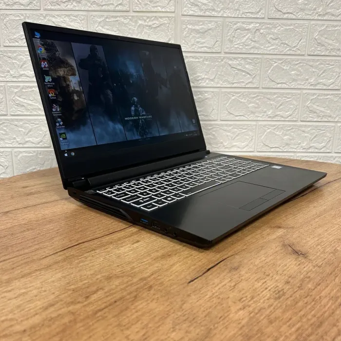 Ігровий ноутбук Б-клас Sager NH55ED / 15.6" (1920x1080) IPS / Intel Core i7-8750H (6 (12) ядер по 2.2 - 4.1 GHz) / 16 GB DDR4 / 512 GB SSD / nVidia GeForce RTX 2060, 6 GB GDDR6, 192-bit / WebCam б/в - зображення 4