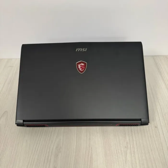 Ігровий ноутбук MSI GL62M 7REX / 15.6" (1920x1080) TN / Intel Core i7-7700HQ (4 (8) ядра по 2.8 - 3.8 GHz) / 16 GB DDR4 / 512 GB SSD M.2 / nVidia GeForce GTX 1050 Ti, 4 GB GDDR5, 128-bit / WebCam б/в - зображення 3