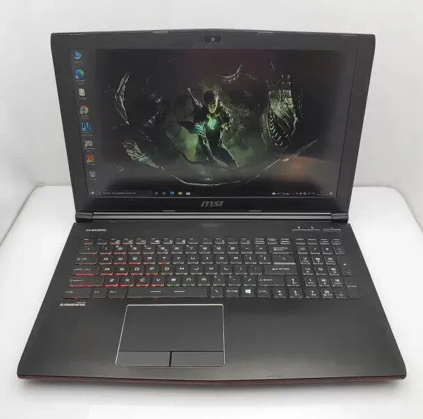 Ігровий ноутбук MSI GE62VR 6RF Apache Pro / 15.6" (1920x1080) IPS / Intel Core i7-6700HQ (4 (8) ядра по 2.6 - 3.5 GHz) / 16 GB DDR4 / 256 GB SSD + 750 GB HDD / nVidia GeForce GTX 1060, 3 GB GDDR5, 192-bit / WebCam / Win 10 Home б/в - зображення 2
