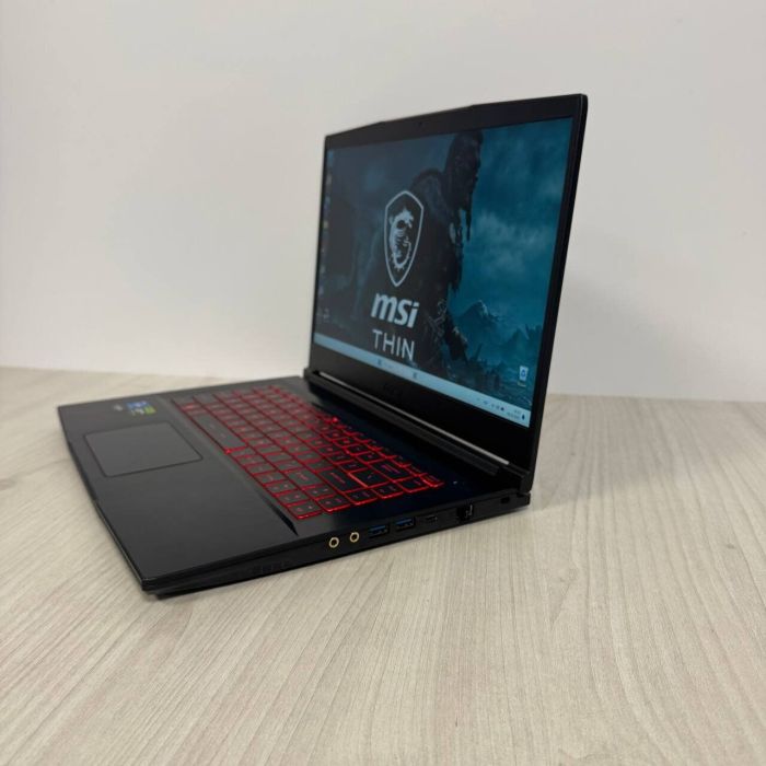 Ігровий ноутбук Б-класу MSI GF63 Thin 11UC / 15.6" (1920x1080) IPS / Intel Core i5-11400H (6 (12) ядер по 2,7 - 4,5 ГГц) / 16 ГБ DDR4 / 512 ГБ SSD NVMe / nVidia GeForce RTX 3050, 4 ГБ GDDR6, 128-bit / WebCam б/в - зображення 5