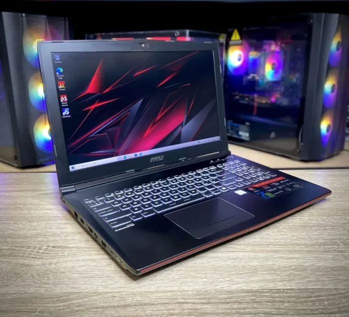 Ігровий ноутбук MSI GP62MVR 6RF Leopard Pro / 15.6" (1920x1080) IPS / Intel Core i7-7700HQ (4 (8) ядра по 2.8 - 3.8 GHz) / 8 GB DDR4 / 128 GB SSD + 1000 GB HDD / nVidia GeForce GTX 1060, 3 GB GDDR5, 192-bit / WebCam б/в - зображення 3