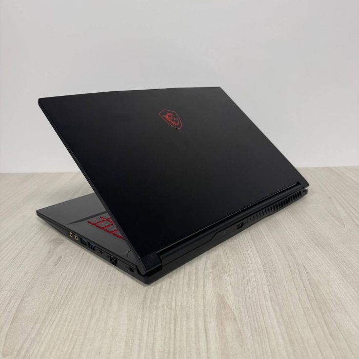 Ігровий ноутбук Б-класу MSI GF63 Thin 11UC / 15.6" (1920x1080) IPS / Intel Core i5-11400H (6 (12) ядер по 2,7 - 4,5 ГГц) / 16 ГБ DDR4 / 512 ГБ SSD NVMe / nVidia GeForce RTX 3050, 4 ГБ GDDR6, 128-bit / WebCam б/в - зображення 6