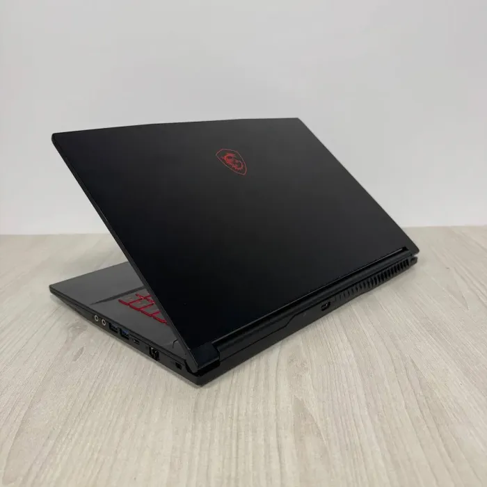 Ігровий ноутбук Б-класу MSI GF63 Thin 11UC / 15.6" (1920x1080) IPS / Intel Core i5-11400H (6 (12) ядер по 2,7 - 4,5 ГГц) / 16 ГБ DDR4 / 512 ГБ SSD NVMe / nVidia GeForce RTX 3050, 4 ГБ GDDR6, 128-bit / WebCam б/в - зображення 6