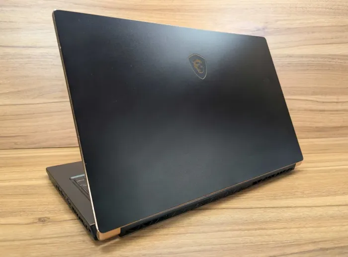 Ігровий ноутбук Б-клас MSI MS-17G1 / 17.3" (1920x1080) IPS / Intel Core i7-9750H (6 (12) ядер по 2.6 - 4.5 GHz) / 16 GB DDR4 / 512 GB SSD / nVidia GeForce RTX 2070, 8 GB GDDR6, 256-bit / WebCam / Windows 10 б/в - зображення 9