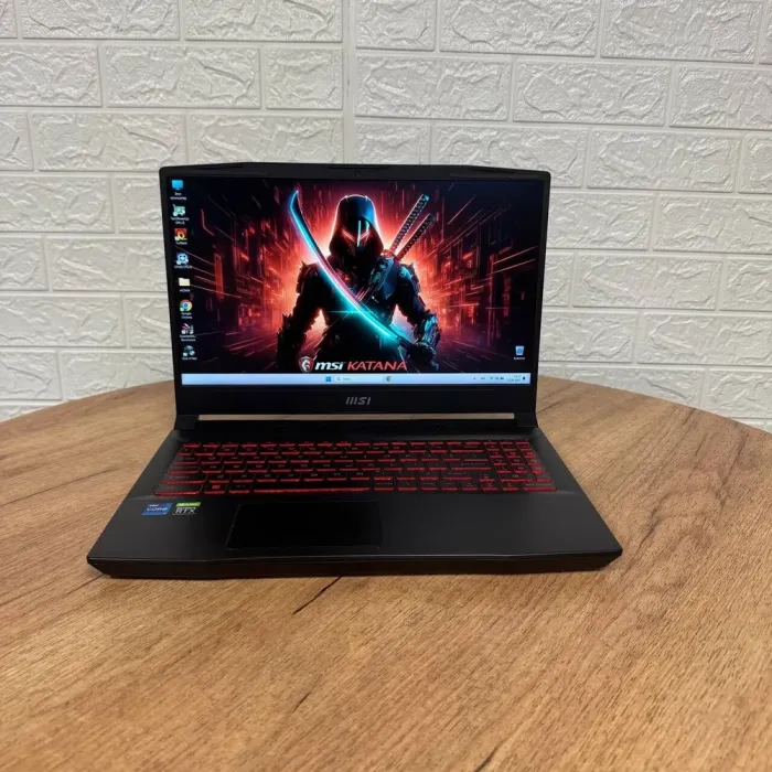 Ігровий ноутбук MSI Katana GF66 11UE / 15.6" (1920x1080) IPS / Intel Core i7-11800H (8 (16) ядер по 2.3 - 4.6 GHz) / 16 GB DDR4 / 512 GB SSD NVMe / nVidia GeForce RTX 3060, 6 GB GDDR6, 192-bit / WebCam б/в - зображення 2