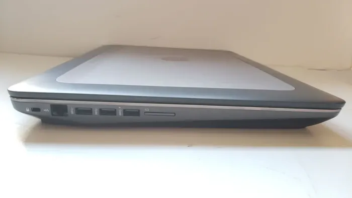 Мобільна робоча станція HP ZBook 17 G3 / 17,3" (1600x900) TN / Intel Core i5-6440HQ (4 ядра по 2,6 - 3,5 ГГц) / 16 ГБ DDR4 / 128 ГБ SSD + 128 ГБ SSD + 750 ГБ HDD / nVidia Quadro M1000M, 2 ГБ GDDR3, 128-біт / WebCam / Без АКБ б/в - зображення 10