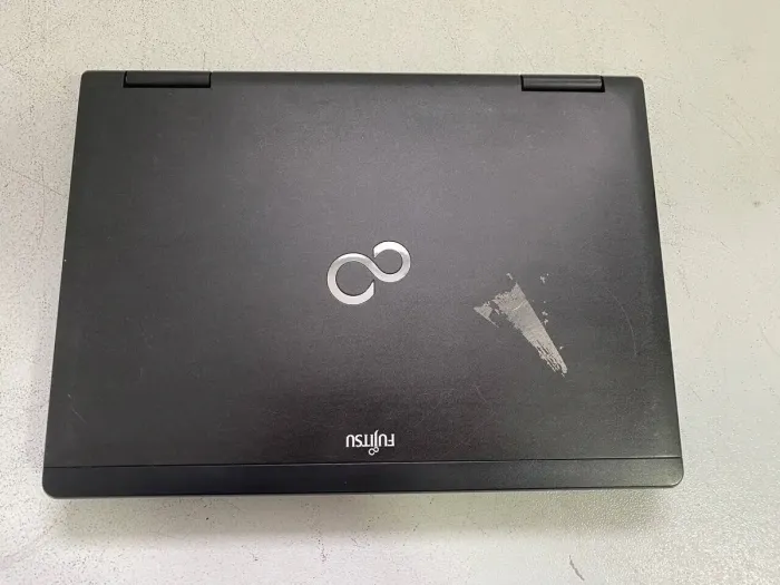 Ноутбук Б-клас Fujitsu LifeBook S782 / 14" (1600x900) TN / Intel Core i7-3612QM (4 (8) ядра по 2.1 - 3.1 GHz) / 16 GB DDR3 / 256 GB SSD / Intel HD Graphics 4000 / WebCam / DVD-ROM б/в - зображення 3