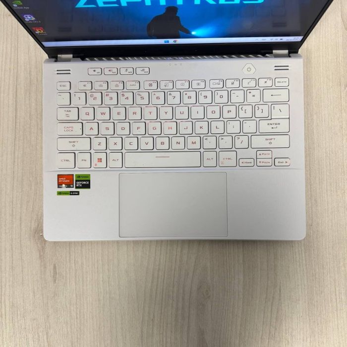 Ігровий ультрабук Asus ROG Zephyrus G14 GA402XY / 14" (2560x1600) IPS / AMD Ryzen 9 7940HS (8 (16) ядер по 4.0 - 5.2 GHz) / 32 GB DDR5 / 1000 GB SSD NVMe / nVidia GeForce RTX 4090, 16 GB GDDR6, 256-bit / WebCam б/в - зображення 7
