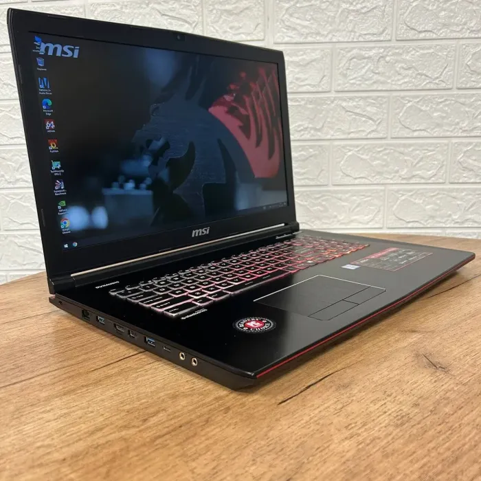 Ігровий ноутбук Б-клас MSI GE72VR 7RF Apache Pro / 17.3" (1920x1080) TN / Intel Core i7-7700HQ (4 (8) ядра по 2.8 - 3.8 GHz) / 16 GB DDR4 / 128 GB SSD M.2 + 1000 GB HDD / nVidia GeForce GTX 1060, 3 GB GDDR5, 192-bit / WebCam б/в - зображення 4