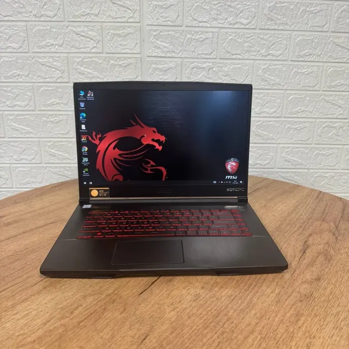 Ігровий ноутбук Б-клас MSI GF65 Thin 9SEXR / 15.6" (1920x1080) IPS / Intel Core i7-9750H (6 (12) ядра по 2.6 - 4.5 GHz) / 16 GB DDR4 / 512 GB SSD NVMe / nVidia GeForce RTX 2060, 6 GB GDDR6, 192-bit / WebCam б/в - зображення 2