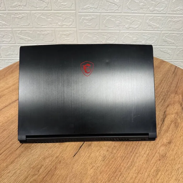 Ігровий ноутбук Б-клас MSI GF65 Thin 9SD / 15.6" (1920x1080) IPS / Intel Core i7-9750H (6 (12) ядер по 2.6 - 4.5 GHz) / 16 GB DDR4 / 512 GB SSD / nVidia GeForce GTX 1660 Ti, 6 GB GDDR6, 192-bit / WebCam б/в - зображення 3