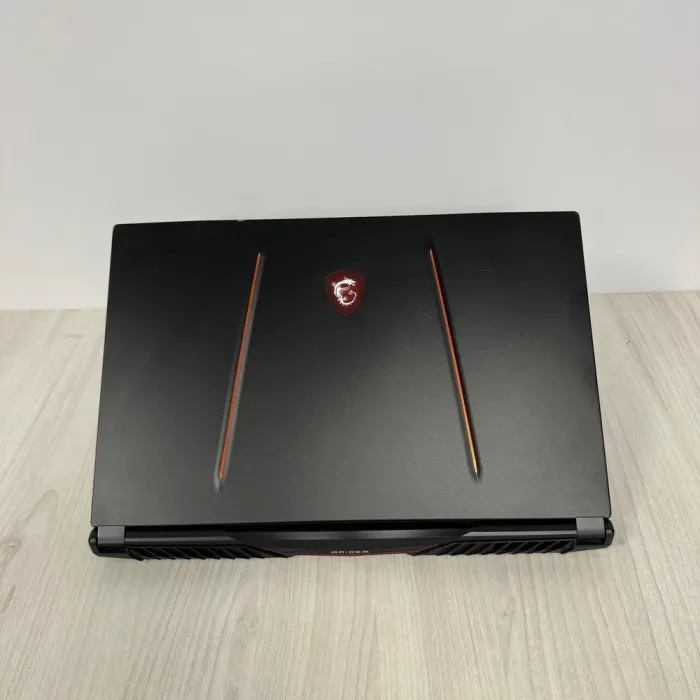 Ігровий ноутбук Б-класу MSI GE75 Raider 9SF / 17.3" (1920x1080) IPS / Intel Core i9-9880H (8 (16) ядер по 2.3 - 4.8 GHz) / 32 GB DDR4 / 512 GB SSD M.2 / nVidia GeForce RTX 2070, 8 GB GDDR6, 256-bit / WebCam б/в - зображення 3