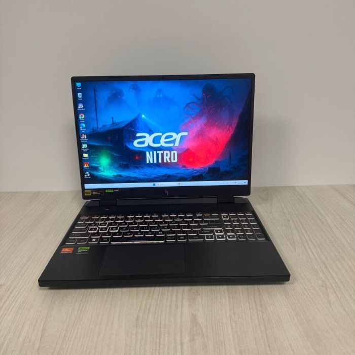 Ігровий ноутбук Б-класу Acer Nitro 16 AN16-41 / 16" (2560x1600) IPS / AMD Ryzen 7 7840HS (8 (16) ядер по 3,8 - 5,1 ГГц) / 32 ГБ DDR5 / 1000 ГБ SSD NVMe / nVidia GeForce RTX 4070, 8 ГБ GDDR6, 128-біт / WebCam б/в - зображення 2
