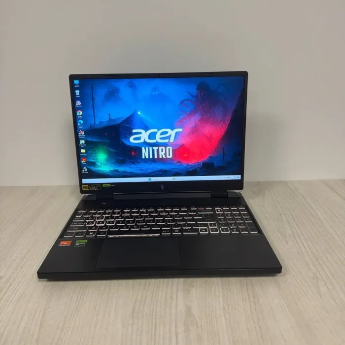 Ігровий ноутбук Б-класу Acer Nitro 16 AN16-41 / 16" (2560x1600) IPS / AMD Ryzen 7 7840HS (8 (16) ядер по 3,8 - 5,1 ГГц) / 32 ГБ DDR5 / 1000 ГБ SSD NVMe / nVidia GeForce RTX 4070, 8 ГБ GDDR6, 128-біт / WebCam б/в - зображення 2