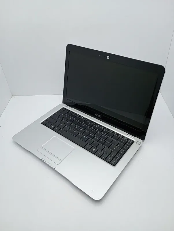 Ноутбук MSI X300 / 13.3" (1366x768) TN / Intel Core 2 Solo ULV SU3500 (1 ядро по 1.4 GHz) / 2 GB DDR3 / 250 GB HDD / Intel GMA 4500MHD / WebCam б/в - зображення 6