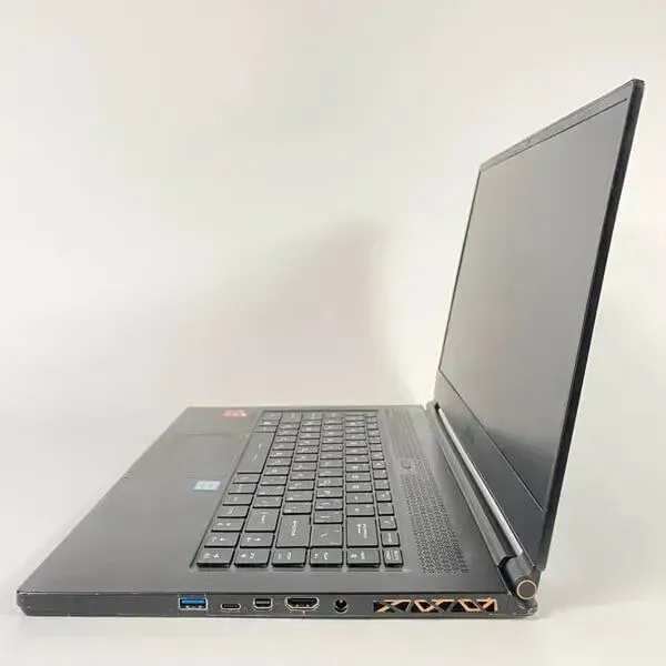 Ігровий ноутбук Б-клас MSI GS65 Stealth Thin 8RF / 15.6" (1920x1080) IPS / Intel Core i7-8750H (6 (12) ядер по 2.2 - 4.1 GHz) / 16 GB DDR4 / 512 GB SSD / nVidia GeForce GTX 1070 Max-Q, 8 GB GDDR5, 256-bit / WebCam б/в - зображення 5