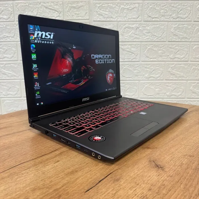 Ігровий ноутбук Б-клас MSI GF62VR 7RF Apache Pro / 15.6" (3840x2160) IPS / Intel Core i7-7700HQ (4 (8) ядра по 2.8 - 3.8 GHz) / 16 GB DDR4 / 128 GB SSD + 1000 GB HDD / nVidia GeForce GTX 1060, 6 GB GDDR5, 192-bit / WebCam б/в - зображення 4