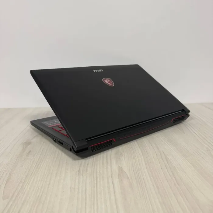 Ігровий ноутбук MSI GL62M 7REX / 15.6" (1920x1080) TN / Intel Core i7-7700HQ (4 (8) ядра по 2.8 - 3.8 GHz) / 16 GB DDR4 / 512 GB SSD M.2 / nVidia GeForce GTX 1050 Ti, 4 GB GDDR5, 128-bit / WebCam б/в - зображення 6