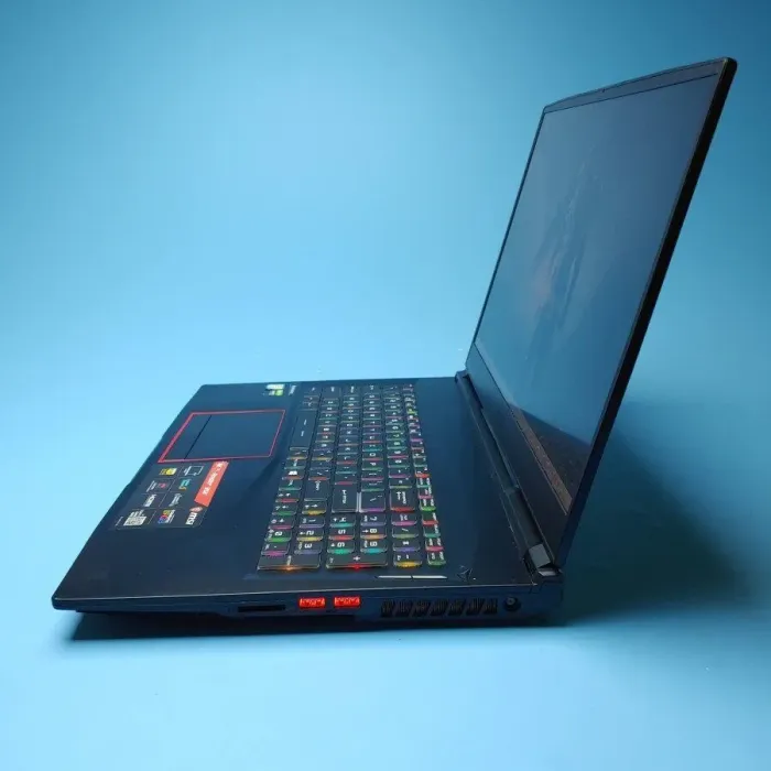 Ігровий ноутбук MSI GE75 Raider 9SE / 17.3" (1920x1080) IPS / Intel Core i7-8750H (6 (12) ядер по 2.2 - 4.1 GHz) / 16 GB DDR4 / 480 GB SSD / nVidia GeForce RTX 2060, 6 GB GDDR6, 192-bit / WebCam / Win 10 Home б/в - зображення 4
