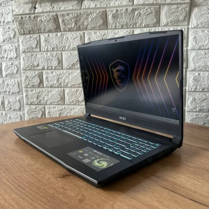 Ігровий ноутбук MSI Bravo 15 C7VE / 15.6" (1920x1080) IPS / AMD Ryzen 5 7535HS (6 (12) ядер по 3.3 - 4.55 GHz) / 16 GB DDR4 / 512 GB SSD / nVidia GeForce RTX 4050, 6 GB GDDR6, 96-bit / WebCam б/в - зображення 5