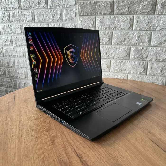 Ігровий ноутбук MSI GF63 Thin 9SCX / 15.6" (1920x1080) IPS / Intel Core i5-9300H (4 (8) ядра по 2.4 - 4.1 GHz) / 8 GB DDR4 / 512 GB SSD / nVidia GeForce GTX 1650 Max-Q, 4 GB GDDR6, 128-bit / WebCam б/в - зображення 4