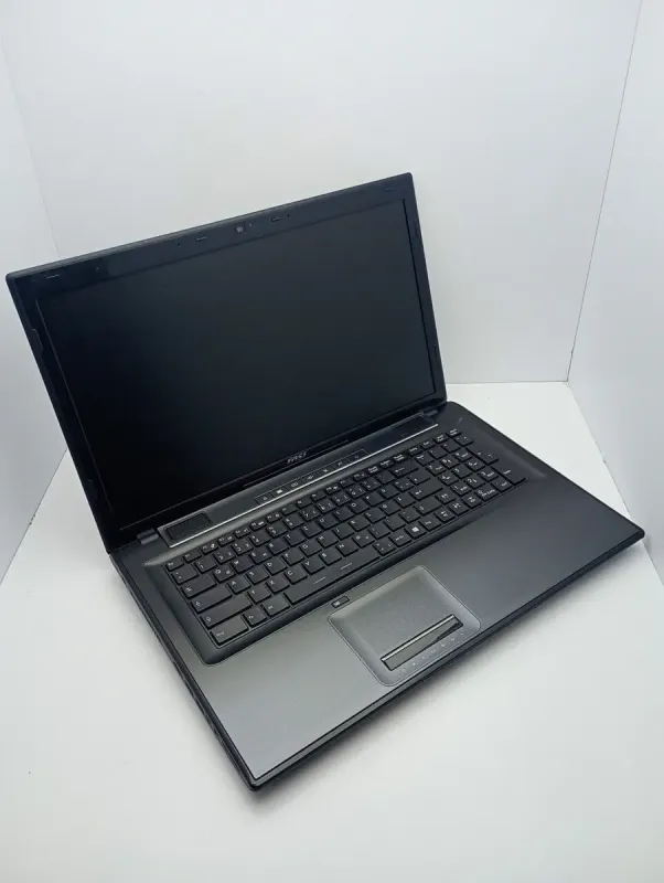 Ноутбук MSI CR70 / 17.3" (1600x900) TN / Intel Core i5-4310M (2 (4) ядра по 2.7 - 3.4 GHz) / 8 GB DDR3 / 1000 GB HDD / Intel HD Graphics 4600 / WebCam б/в - зображення 5